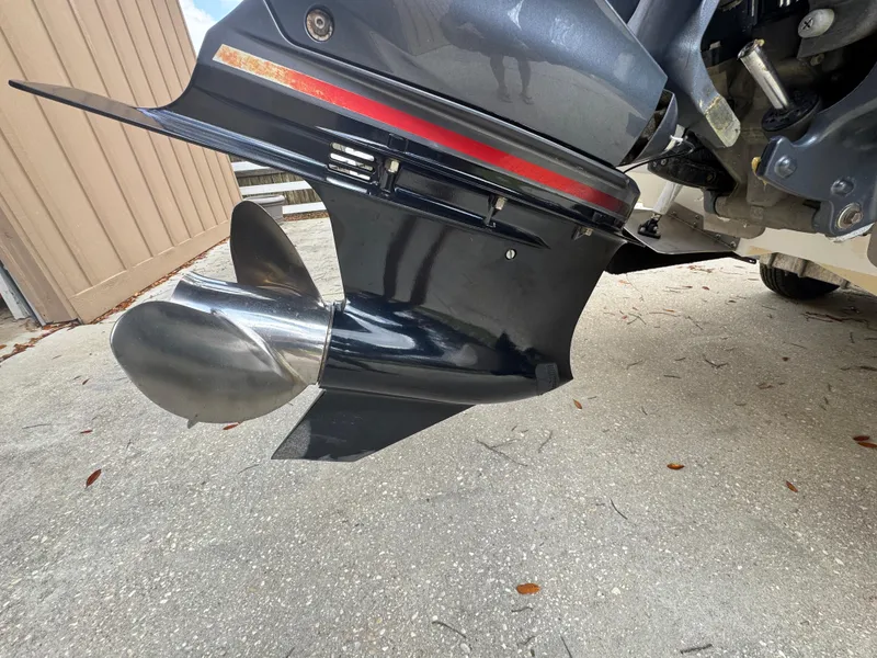 Slide: The Image of Outboard motor propeller of a 2011 BlackJack 224 boat on concrete surface. - 29