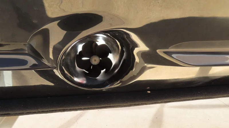 Slide: The Image of Close-up of a 2023 Nor-Tech 450 boat thruster in a sleek, polished hull. - 10