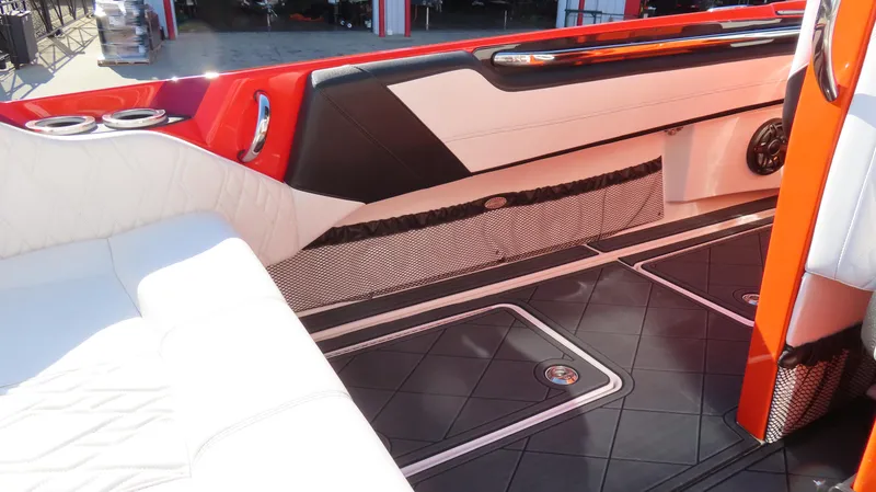 Slide: The Image of Luxurious interior of 2023 Nor-Tech 450 boat with sleek seating and modern design. - 17