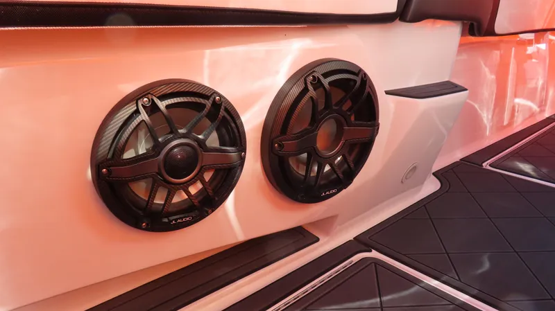 Slide: The Image of 2023 Nor-Tech 450 boat speakers, sleek design, high-quality audio system. - 23