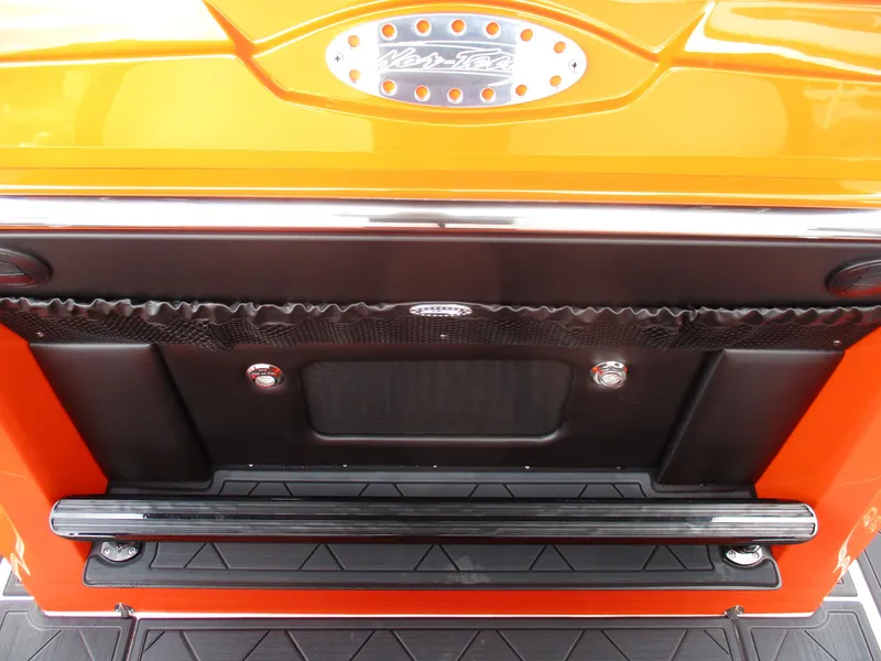 Slide: The Image of 2023 Nor-Tech 450 boat, orange and black detailing, rear view with logo. - 46