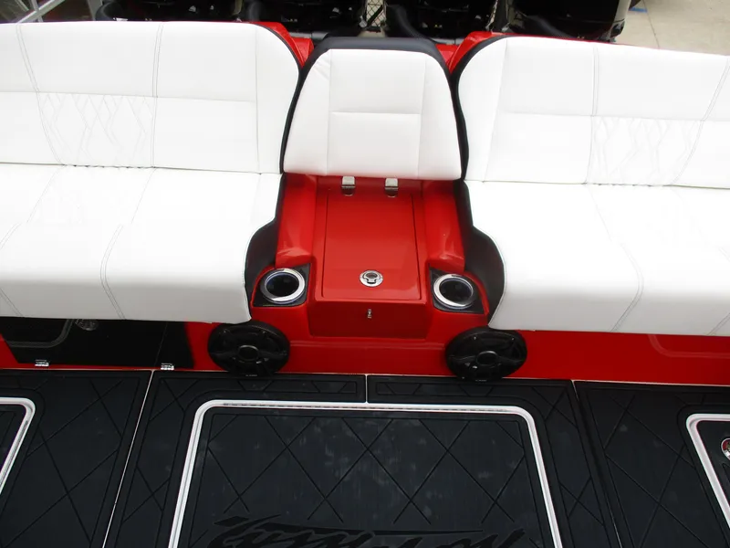 Slide: The Image of 2023 Nor-Tech 450 boat interior with white seating and red accents. - 48