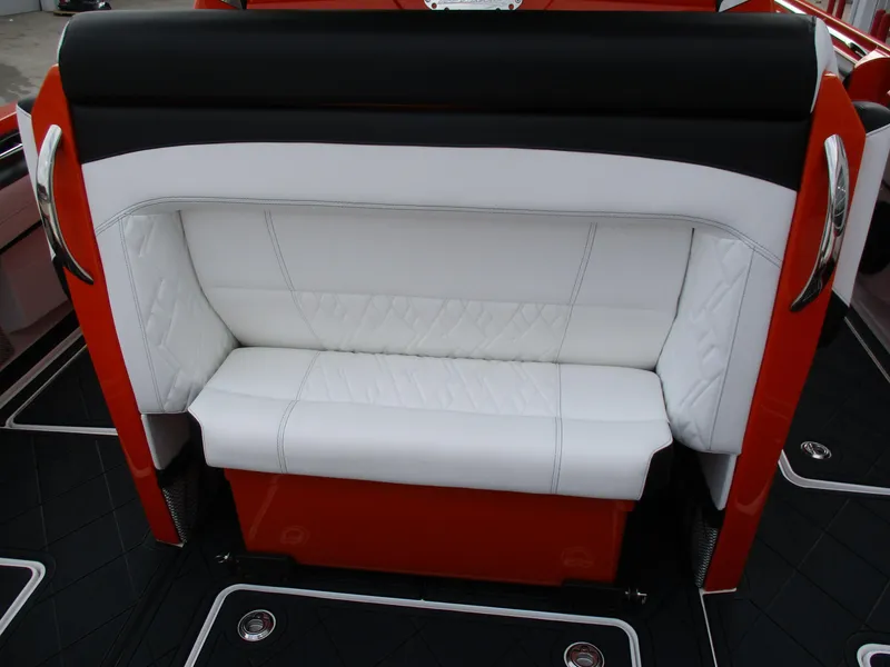 Slide: The Image of 2023 Nor-Tech 450 boat interior with white and red seating. - 50