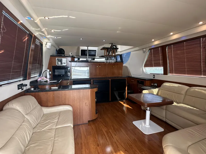 Slide: The Image of Luxurious interior of 1999 Carver 530 Voyager Pilothouse yacht with modern amenities. - 10