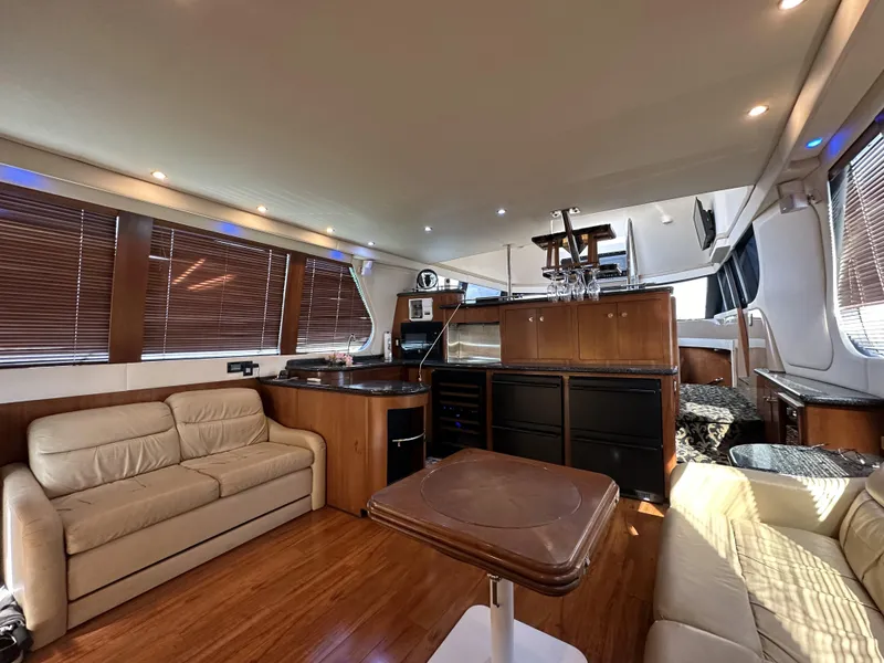 Slide: The Image of Luxurious interior of 1999 Carver 530 Voyager Pilothouse yacht with elegant furnishings. - 11