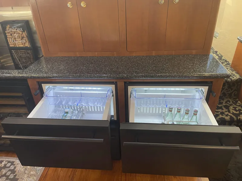 Slide: The Image of Dual drawer refrigerators in a 1999 Carver 530 Voyager Pilothouse yacht kitchen. - 13