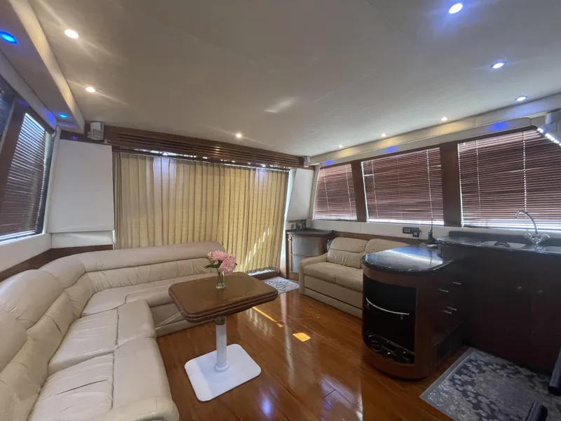 Slide: The Image of Luxurious interior of 1999 Carver 530 Voyager Pilothouse with elegant seating and modern decor. - 2