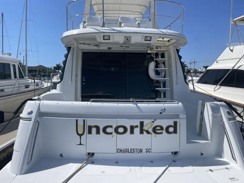 Slide: The Image of 1999 Carver 530 Voyager Pilothouse yacht named "Uncorked" docked in Charleston, SC. - 38