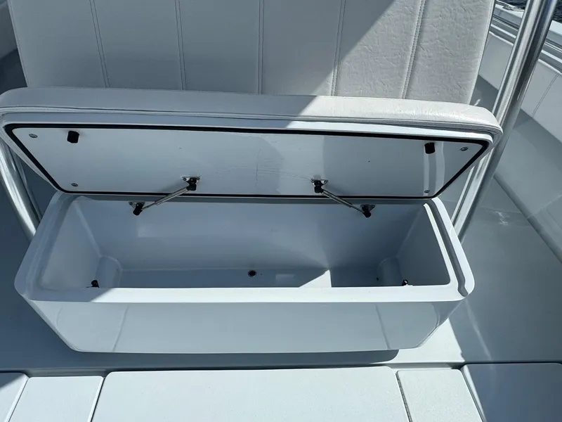 Slide: The Image of Open storage compartment on 2022 Contender 44 ST boat. - 10