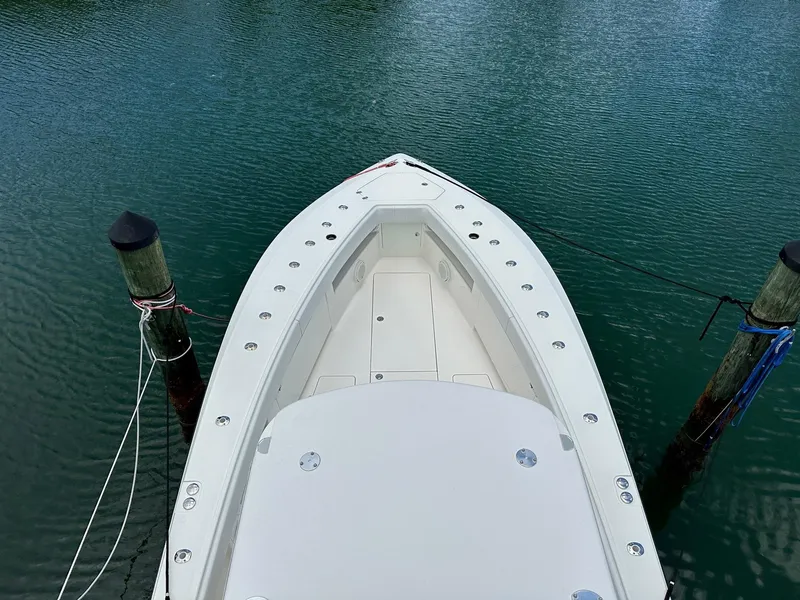 Slide: The Image of 2018 SeaVee 390Z boat docked on calm water, viewed from above. - 14