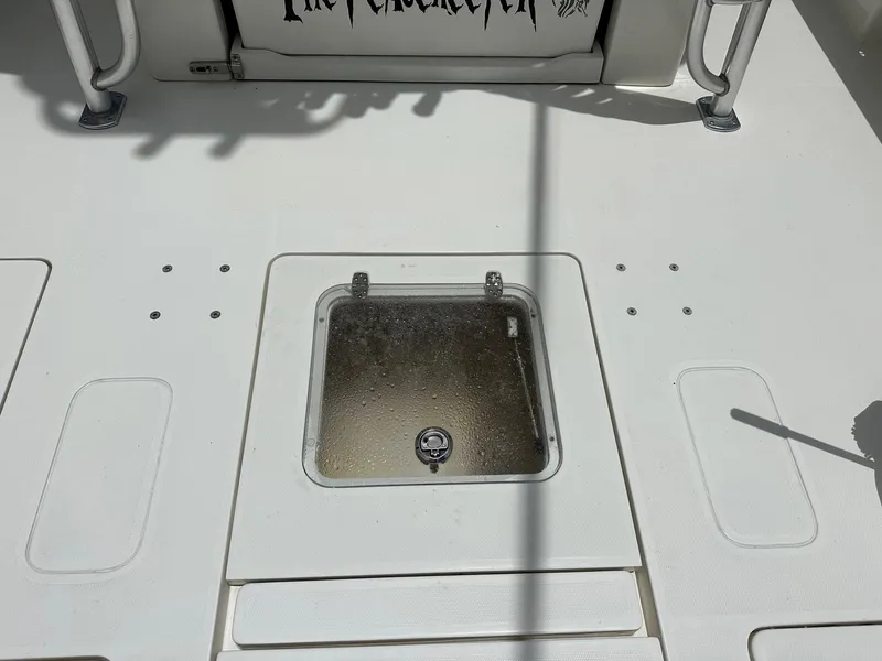 Slide: The Image of 2018 SeaVee 390Z deck with a closed hatch and stainless steel fittings. - 19