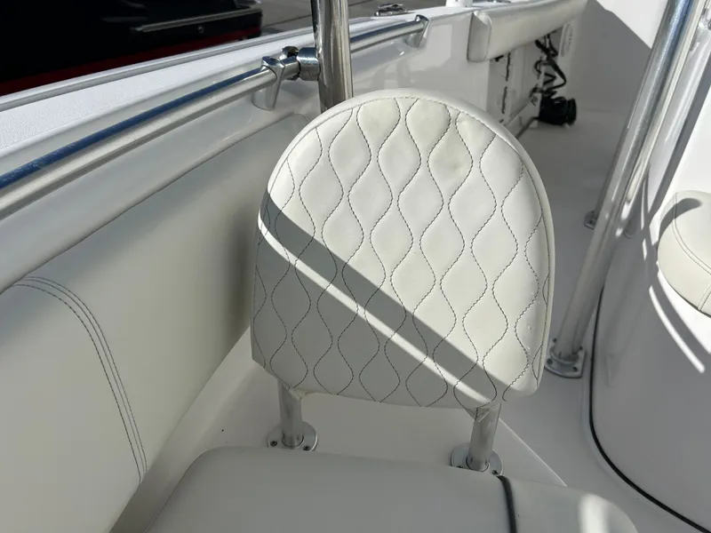 Slide: The Image of 2020 Sportsman Open 232 Center Console boat seat with diamond stitching. - 16