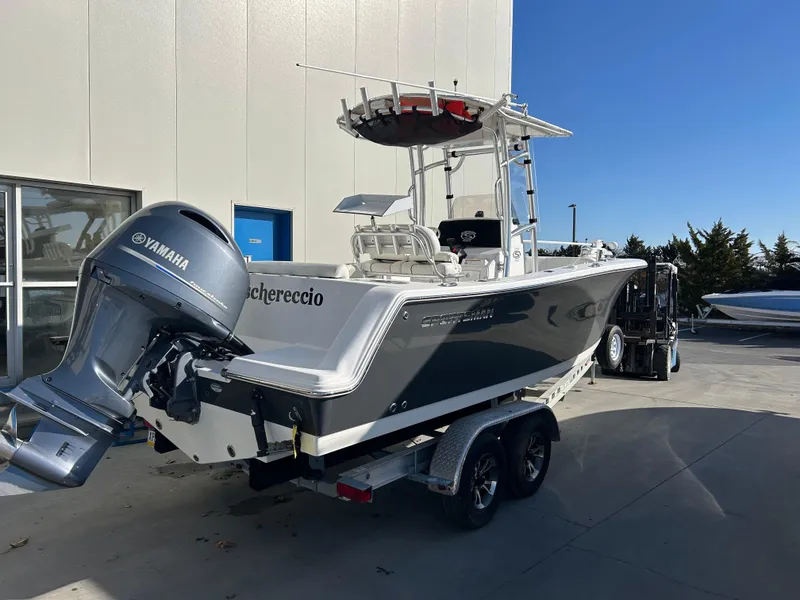 Slide: The Image of 2020 Sportsman Open 232 Center Console boat with Yamaha engine on trailer. - 3