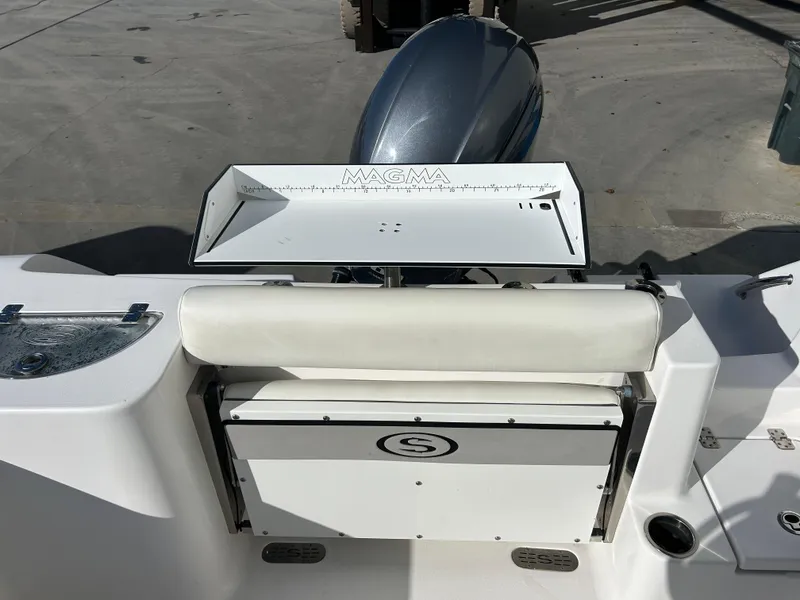Slide: The Image of 2020 Sportsman Open 232 Center Console boat with Magma cutting board and seating. - 7