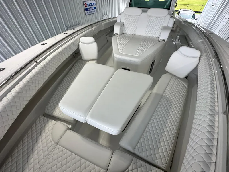 Slide: The Image of Luxurious interior of 2025 HCB 42 Lujo boat with quilted seating. - 19