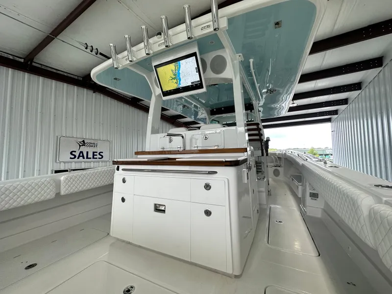 Slide: The Image of 2025 HCB 42 Lujo boat interior with modern helm and navigation display. - 6