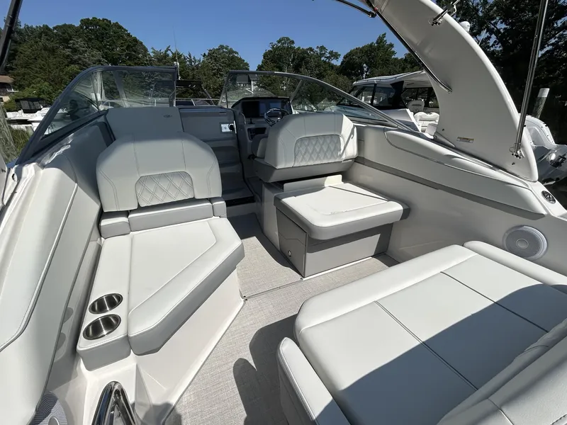 Slide: The Image of 2025 Regal 26 XO boat interior with luxurious seating and modern design. - 5