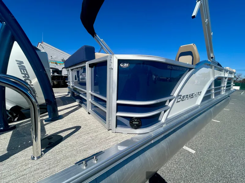 Slide: The Image of 2025 Berkshire 23CL STS 3.0 pontoon boat with sleek design and modern features. - 7