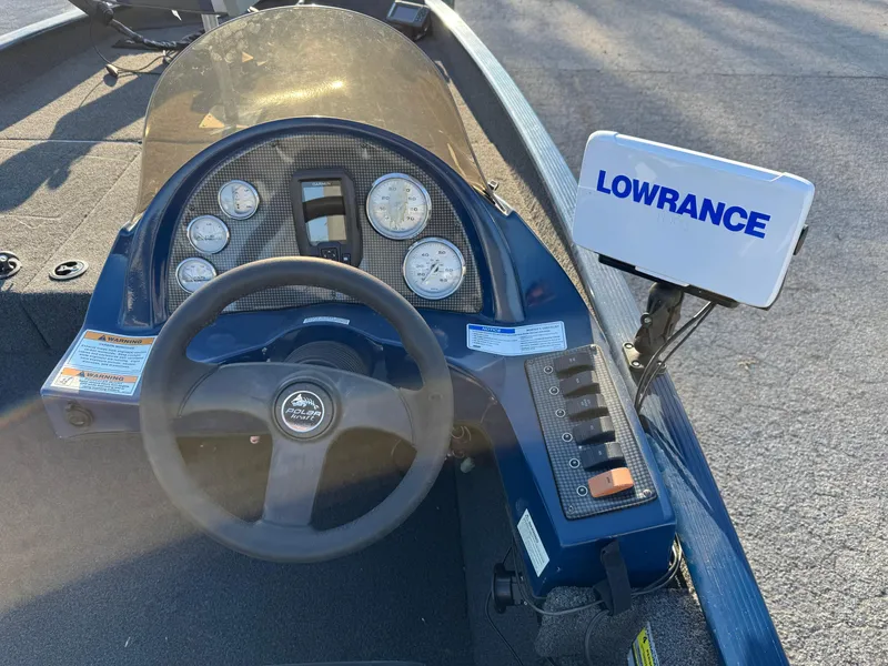 Slide: The Image of 2014 Polar Kraft Bass TX 175 Pro dashboard with Lowrance fish finder and gauges. - 18