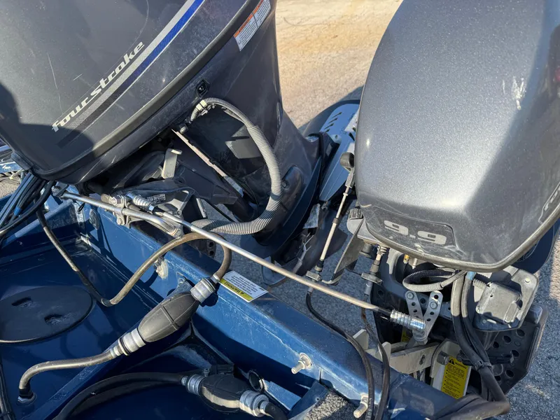 Slide: The Image of 2014 Polar Kraft Bass TX 175 Pro boat engine close-up, featuring a four-stroke motor. - 23