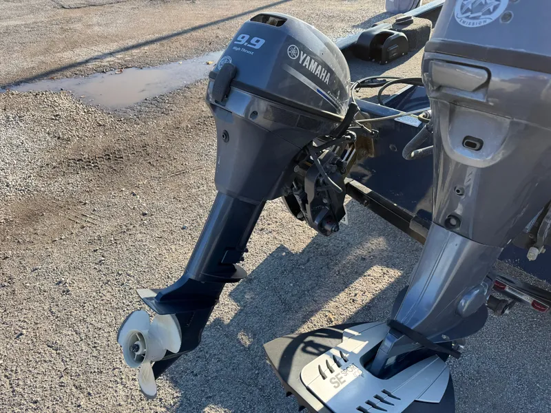 Slide: The Image of 2014 Polar Kraft Bass TX 175 Pro with Yamaha 9.9 outboard motor on a trailer. - 7