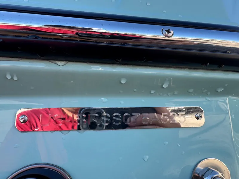 Slide: The Image of 2025 Supra SL 450 nameplate with water droplets and chrome detailing. - 13