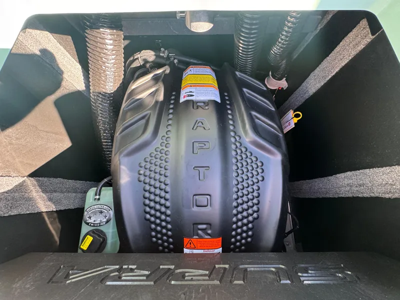 Slide: The Image of Engine compartment of 2025 Supra SL 450 with Raptor branding and visible components. - 24