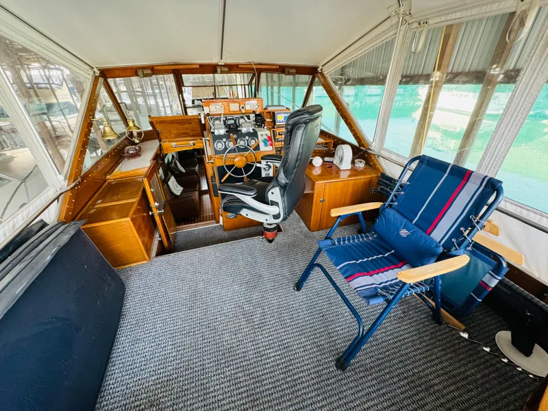 Slide: The Image of 1965 Chris-Craft 38 Constellation cockpit with vintage controls and seating. - 23