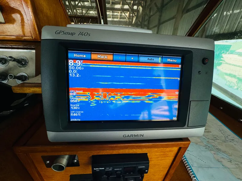 Slide: The Image of Garmin GPSmap 740s on 1965 Chris-Craft 38 Constellation, displaying navigation data. - 29