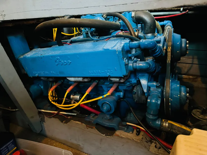 Slide: The Image of 1965 Chris-Craft 38 Constellation engine, blue, detailed view, showcasing mechanical components. - 34