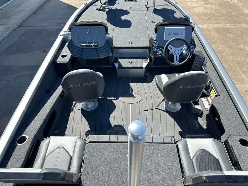 Slide: The Image of 2025 Vexus AVX 1895S boat interior with Garmin system and seating arrangement. - 4