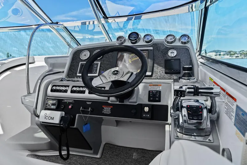 Slide: The Image of Cockpit of 2011 Formula 400 Super Sport boat with steering wheel and control panel. - 45