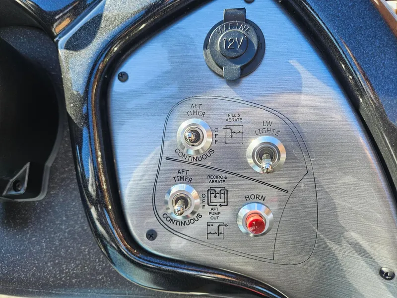 Slide: The Image of Control panel of 2022 Tracker Pro Team 195 TXW Tournament Edition boat. - 10