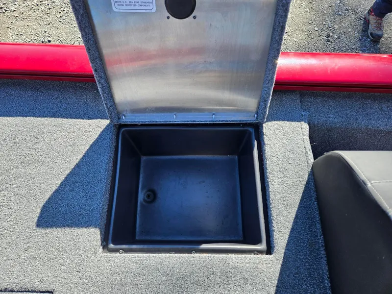 Slide: The Image of 2022 Tracker Pro Team 195 TXW Tournament Edition boat storage compartment open. - 17