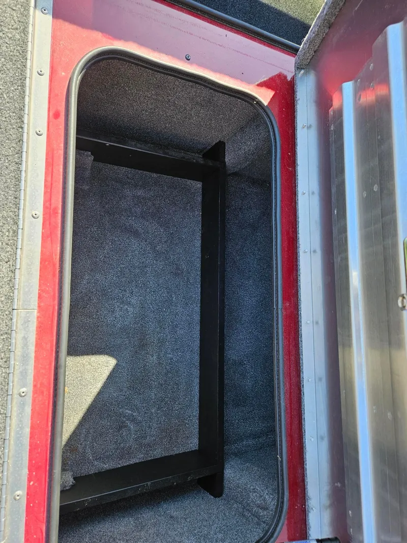 Slide: The Image of Storage compartment of 2022 Tracker Pro Team 195 TXW Tournament Edition boat. - 19