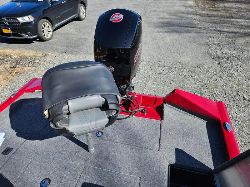 Slide: The Image of 2022 Tracker Pro Team 195 TXW Tournament Edition boat with motor and seating. - 6