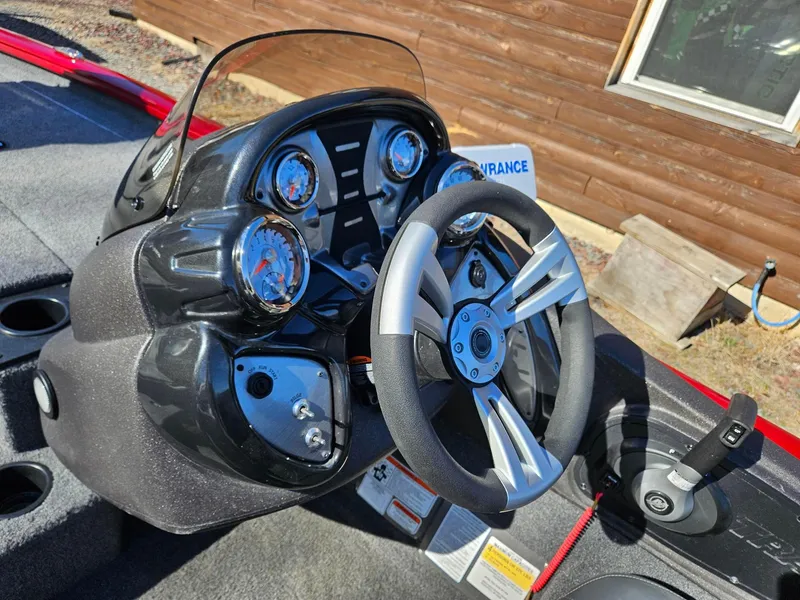 Slide: The Image of Steering console of 2022 Tracker Pro Team 195 TXW Tournament Edition boat. - 8