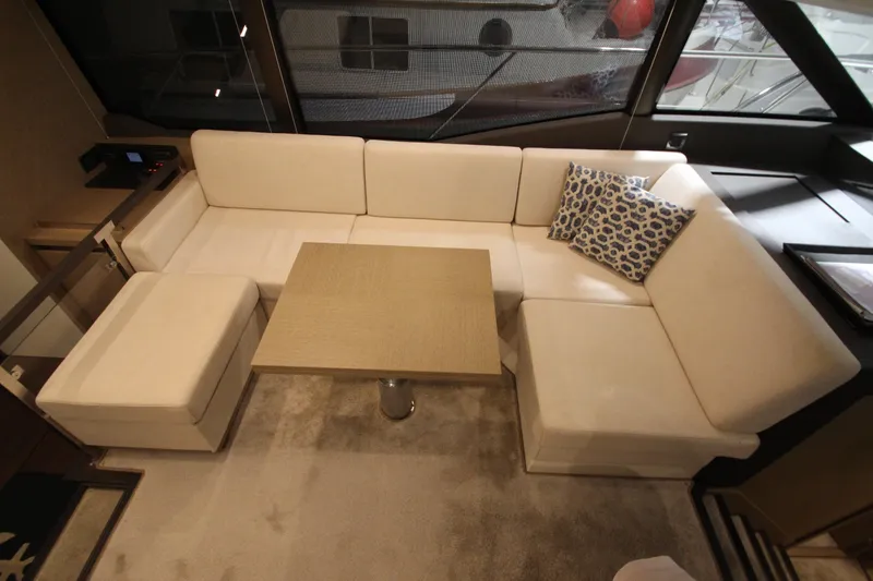Slide: The Image of Luxurious interior of 2019 Prestige 460S yacht with beige seating and modern decor. - 41