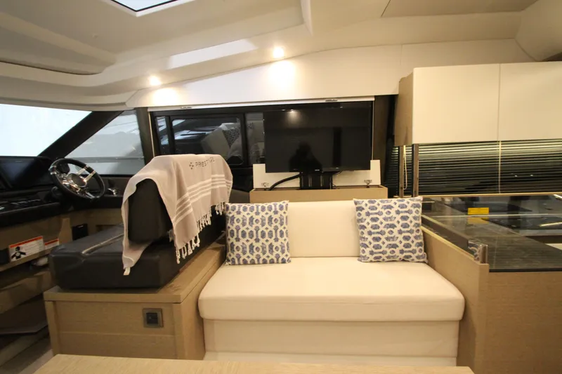 Slide: The Image of Interior of 2019 Prestige 460S yacht with modern seating and elegant decor. - 44