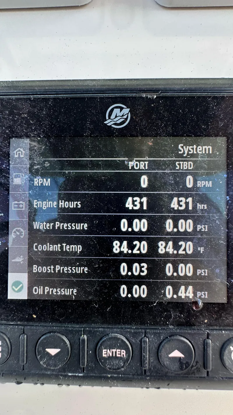Slide: The Image of Display screen showing engine metrics for 2022 Boston Whaler 330 Outrage boat. - 10