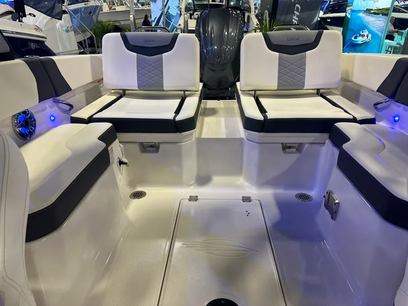 Slide: The Image of 2024 Chaparral 250 OSX OB boat interior with stylish seating and modern design. - 15