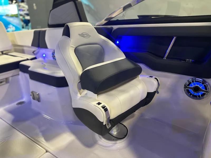 Slide: The Image of 2024 Chaparral 250 OSX OB boat interior with luxurious seating and modern design. - 20
