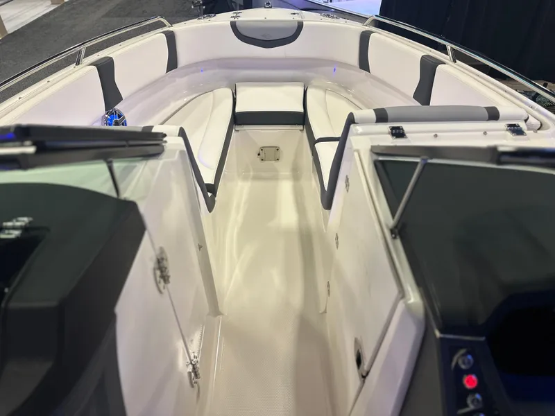 Slide: The Image of 2024 Chaparral 250 OSX OB boat interior with sleek seating and modern design. - 27