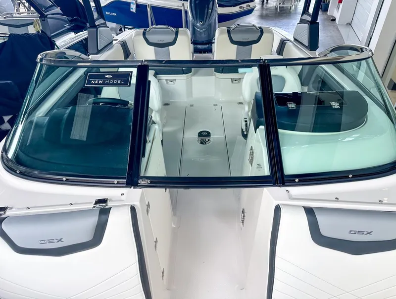 Slide: The Image of 2024 Chaparral 250 OSX OB boat interior with sleek design and modern features. - 32