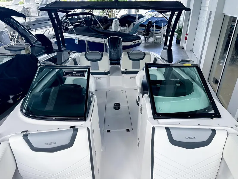Slide: The Image of 2024 Chaparral 250 OSX OB boat interior with sleek design and modern features. - 33