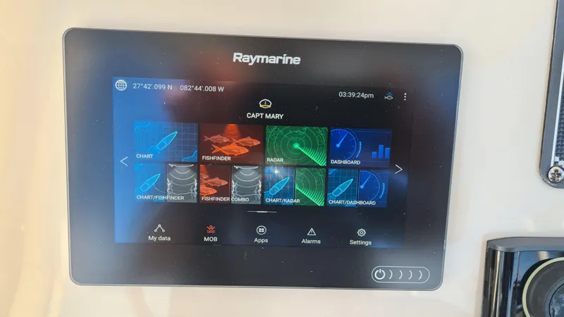 Slide: The Image of Raymarine navigation display on a 2019 Boston Whaler 210 Montauk boat dashboard. - 18