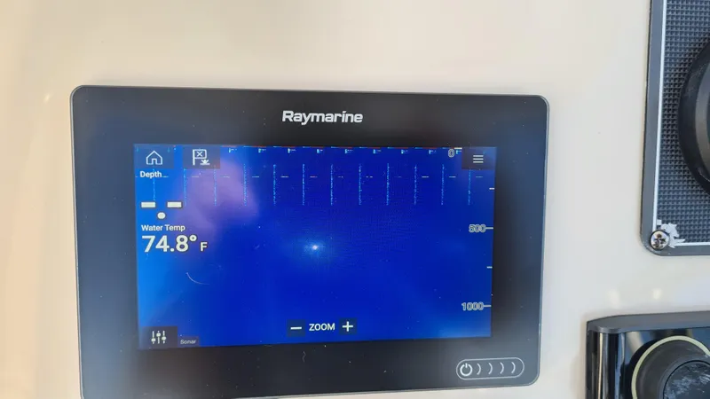 Slide: The Image of Raymarine display on 2019 Boston Whaler 210 Montauk showing water temperature at 74.8°F. - 19