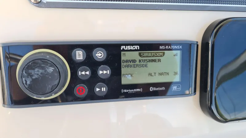 Slide: The Image of Fusion MS-RA70NSX stereo on 2019 Boston Whaler 210 Montauk, displaying SiriusXM channel. - 22