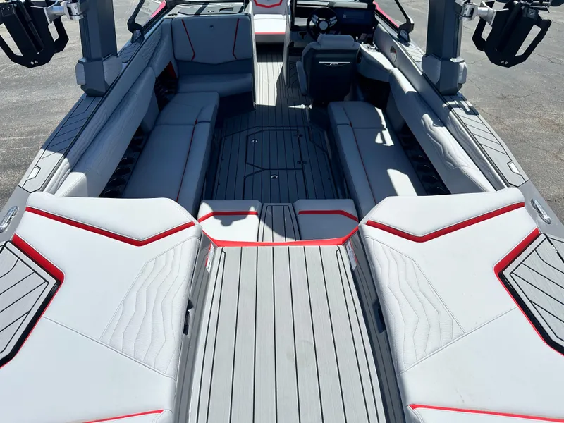 Slide: The Image of 2025 Nautique Super Air Nautique G25 interior with sleek seating and modern design. - 16