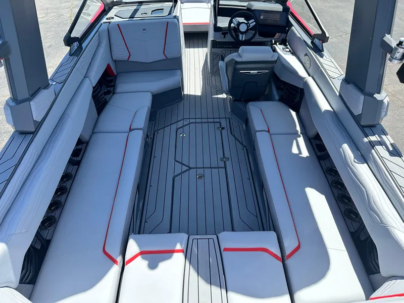 Slide: The Image of 2025 Nautique Super Air Nautique G25 interior with spacious seating and modern design. - 17